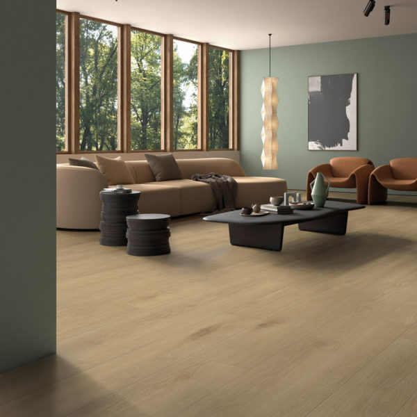Example Furnishing Of A Living Room With OAK Clay Parquet Flooring, Two Armchairs In Orange Ochre On The Right, A Low Living Room Table In Dark Brown In Front Of A Beige Sofa In The Middle, Large Windows Up To The Ceiling In The Background, Five Glass Panels Next To Each Other Filling The Wall Without Gaps